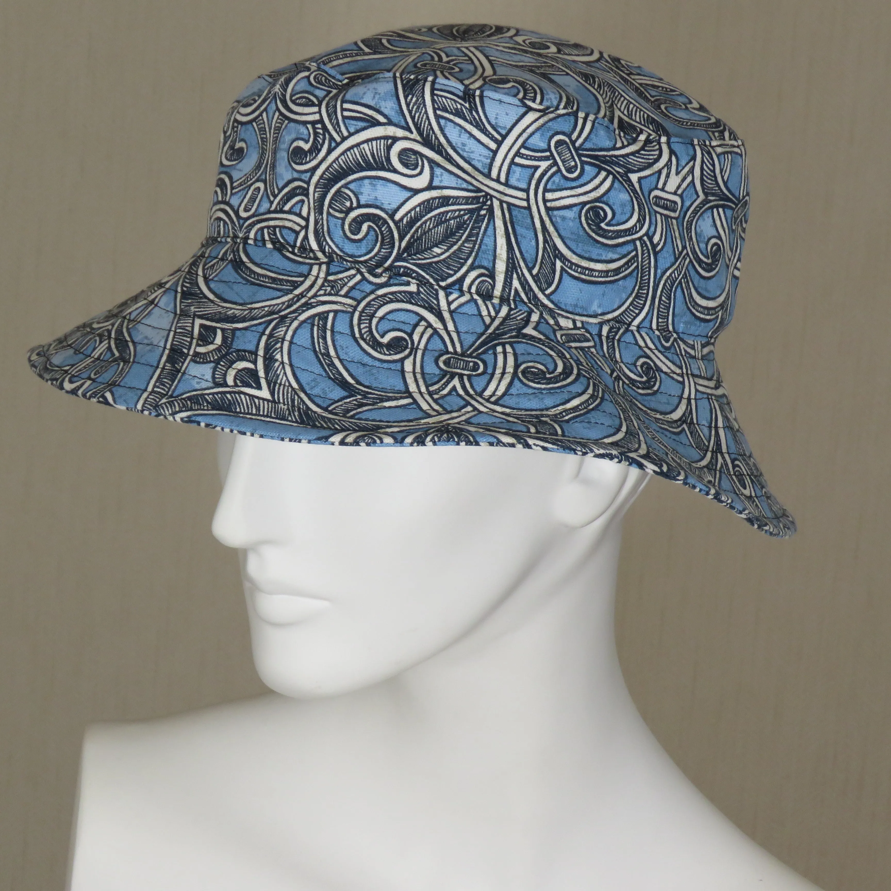 Soiree Brim, Iron Scrollwork Print on Sky Blue Background, Size Large